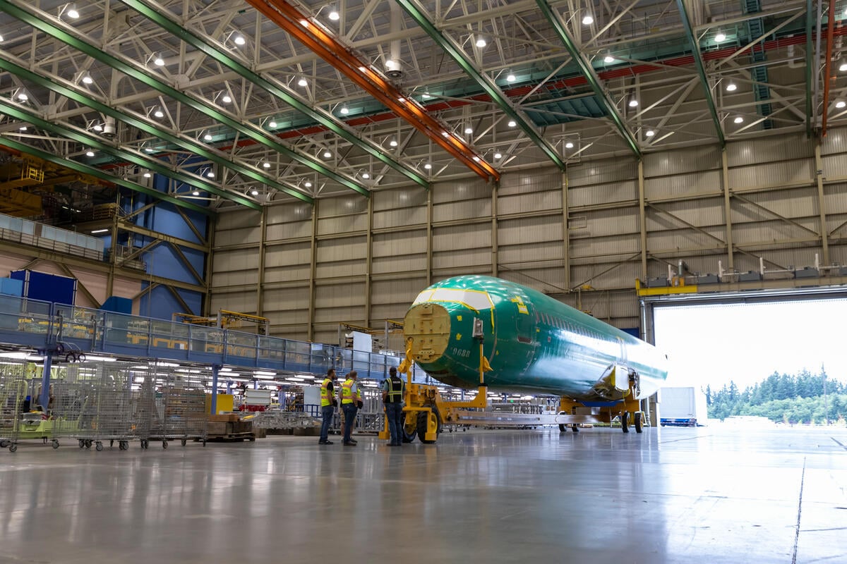 Photo (July 10, 2026) of a 737 fuselage entering Boeing’s new Everett “North Line,” illustrating the factory expansion that underpins Boeing’s focus on ramping 737 output rather than prioritizing airshow order announcements.